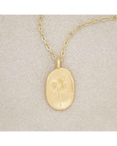 gold plated April birth flower necklace with an 18" gold filled link chain, on beige background