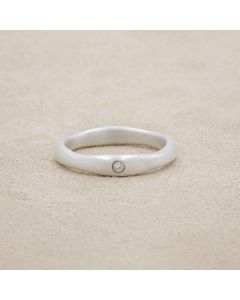 Classic stacking ring hand-molded and cast in 10k white gold with a 2mm birthstone or diamond 