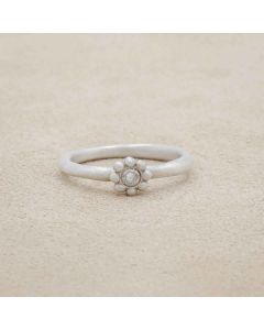 Forever flower wedding ring hand-molded and cast in 10k white gold set with a 3mm birthstone or diamond