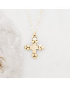 Known and loved cross necklace handcrafted in 10k yellow gold with the cross charm hanging from choice of chain