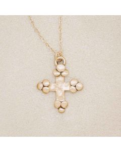Known and loved cross necklace handcrafted in 14k yellow gold with the cross charm hanging from choice of chain