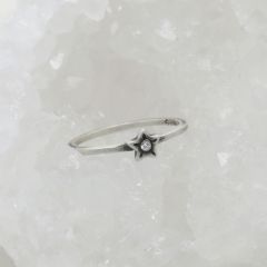 Your spark ring handcrafted in sterling silver with a 1.5mm cubic zirconia stone stackable with multiple rings