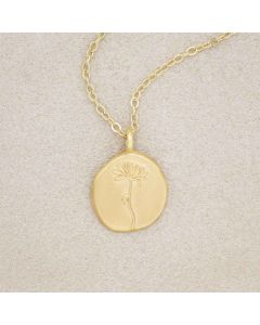 gold plated November birth flower necklace with an 18" gold filled link chain, on beige background