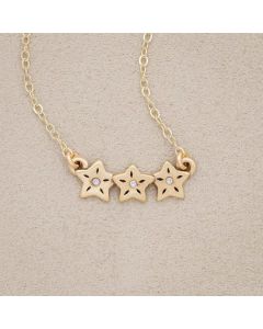 10k yellow gold your spark necklace with 1.5mm cubic zirconia in each star and strung on gold-filled chain chain