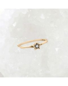 Your spark ring handcrafted in 10k yellow gold with a 1.5mm cubic zirconia stone stackable with multiple rings
