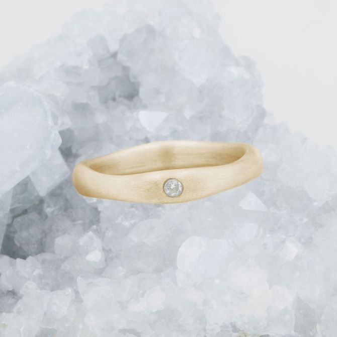 Classic stacking ring hand-molded and cast in 14k yellow gold with a 2mm birthstone or diamond 
