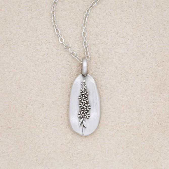 pewter July Birth Flower necklace with 18" link chain, on beige background
