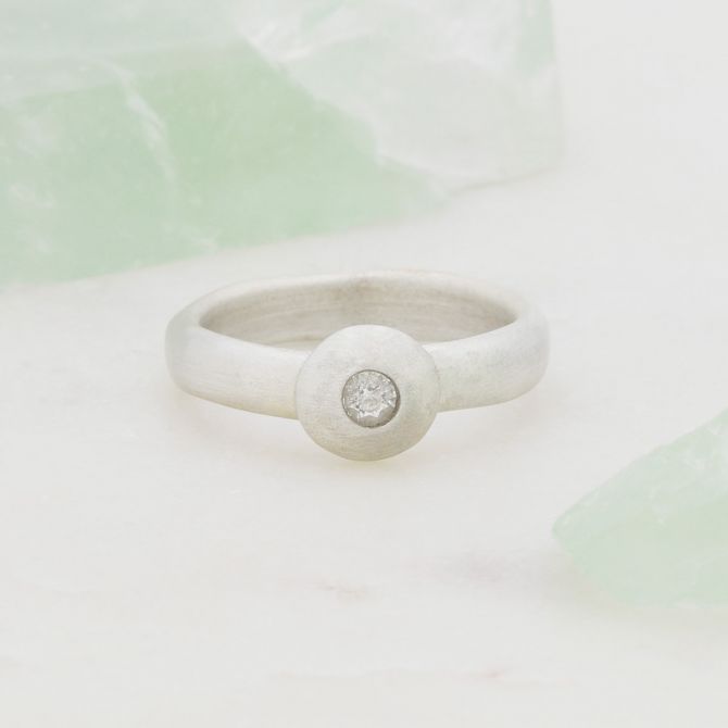 Our Love Endures ring hand-molded in 10k white gold and set with a 3mm birthstone or diamond 