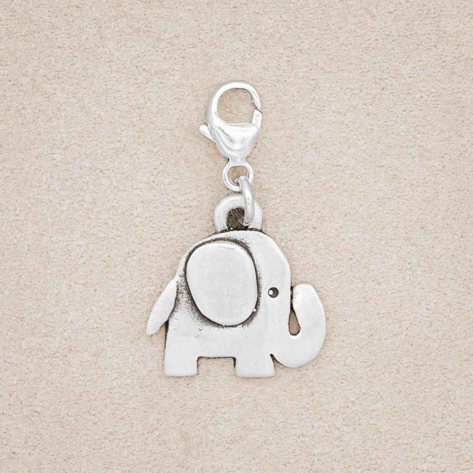 Wise Elephant Bracelet Charm handcrafted in sterling silver, on a suede background