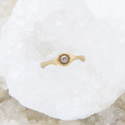 Sunburst stacking ring handcrafted in 14k yellow gold and set with a 3mm bright genuine diamond