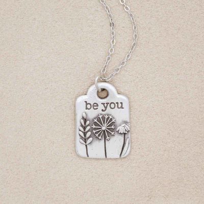 Be you necklace handcrafted in pewter hung on a silver-toned link chain with the words "be you" engraved