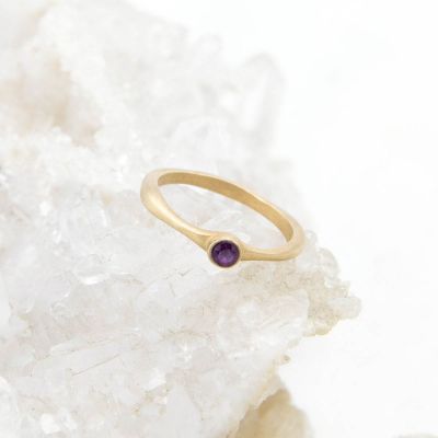 Bezel birthstone ring handcrafted in 10k yellow gold set with a 3mm birthstone inside a gold bezel