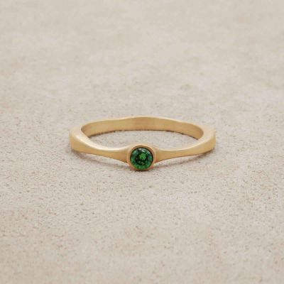 Bezel birthstone ring handcrafted in 14k yellow gold set with a 3mm birthstone inside a gold bezel