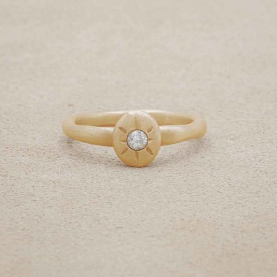 Bright love ring hand-molded in 14k yellow gold set with a 3mm birthstone or diamond