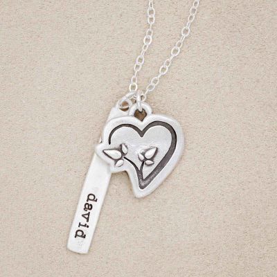 CDLS necklace handcrafted in sterling silver with a heart pendant and a sterling silver tag personalized with a special name