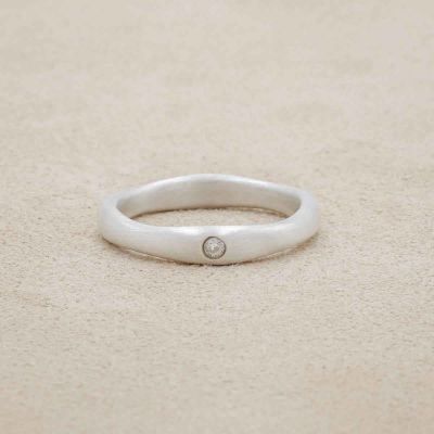 Classic stacking ring hand-molded and cast in 10k white gold with a 2mm birthstone or diamond 