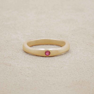 Classic stacking ring hand-molded and cast in 10k yellow gold with a 2mm birthstone or diamond 