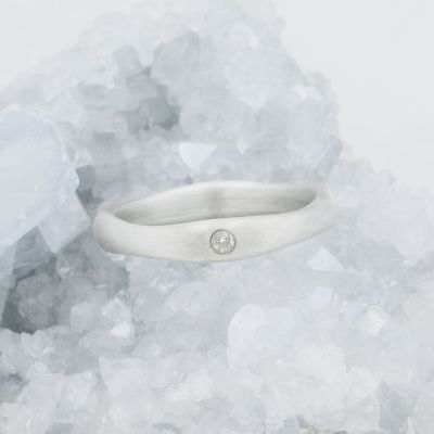 Classic stacking ring hand-molded and cast in sterling silver with a 2mm birthstone or diamond