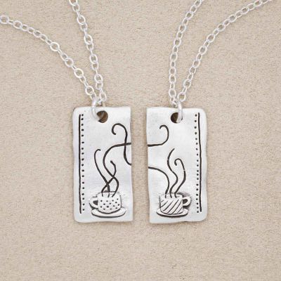 Coffee and tea necklace set handcrafted in sterling silver with a matte brushed finish with engravings to be connected and shared with someone
