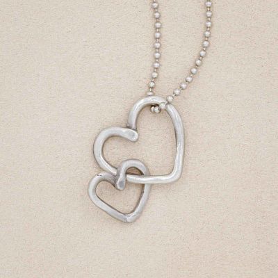 Connected hearts necklace handcrafted in pewter including a pair of heart charms