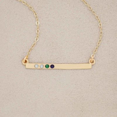 14k yellow gold cross bar birthstone necklace strung on a gold-filled link chain customizable with up to 7 genuine 2mm birthstones 