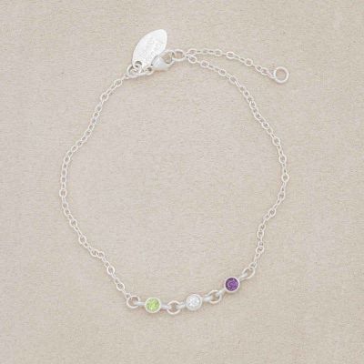 sterling silver Dainty Finespun Birthstone Bracelet - Medium, personalized with 3mm birthstones, on a suede background