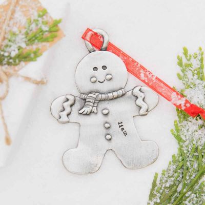 Gingerbread boy ornament  hand-molded and cast in fine pewter hung from a sheer red ribbon with a personalized word