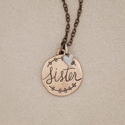 Heart to Heart sister necklace handcrafted in bronze engraved and attached with a sterling silver heart charm