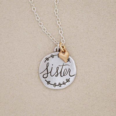 Heart to Heart Sister necklace handcrafted in sterling silver engraved and attached with a bronze heart charm