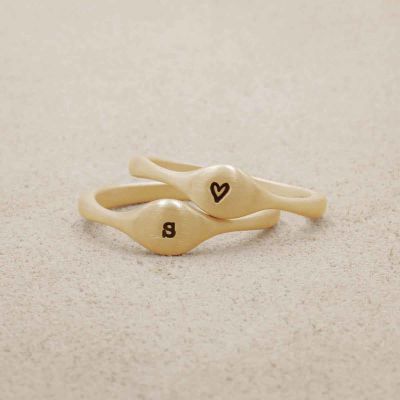 Initial stacking ring handcrafted and cast in 10k yellow gold then hand-stamped with an initial 