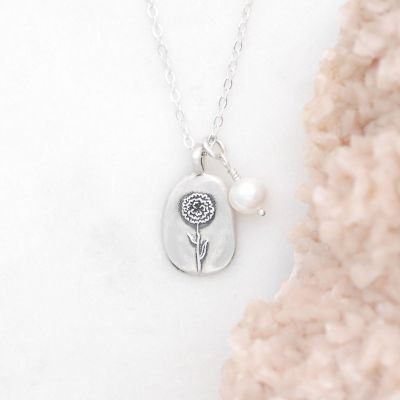 January birth flower necklace handcrafted in sterling silver with a special birth month charm strung with a vintage freshwater pearl
