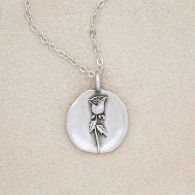 pewter June Birth Flower Necklace with 18" link chain, on beige background