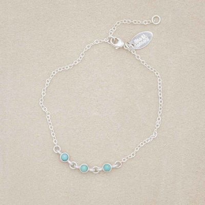 sterling silver Lighthearted Turquoise Bracelet on a beige background