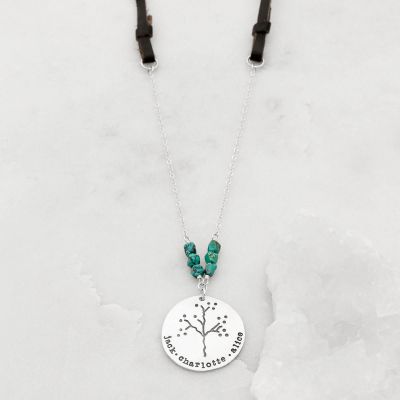 Limited edition family tree necklace with leather handcrafted in sterling silver with the pendant hung next to 6 turquoise beads on a leather cord 