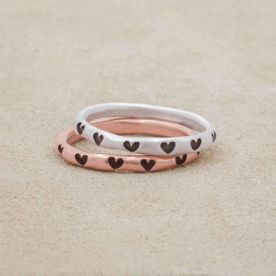 Tiny hearts stacking ring handcrafted in rose gold plated sterling silver with a satin finish stackable with other mix and match rings