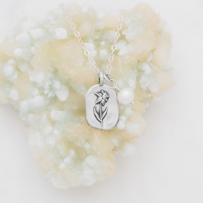 March birth flower necklace handcrafted in sterling silver with a special birth month charm strung with a vintage freshwater pearl