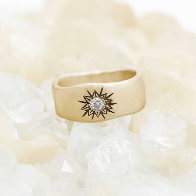 10k yellow gold sunburst diamond ring with a 3mm conflict free diamond 