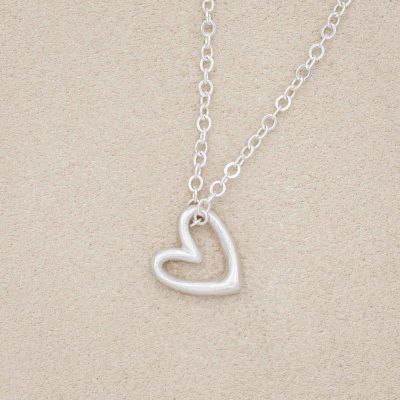 Love Grows necklace handcrafted in sterling silver with the heart charm strung on sterling silver chain