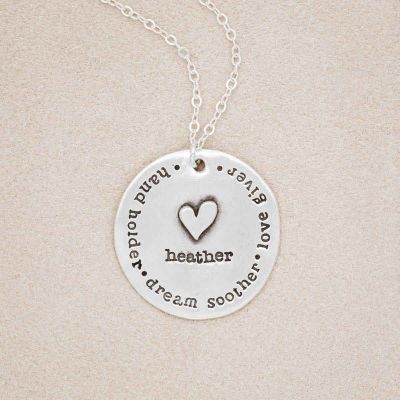 a sterling silver Mama necklace, personalized in the center with a name