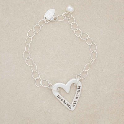 Handcrafted sterling silver molded heart bracelet with a freshwater pearl