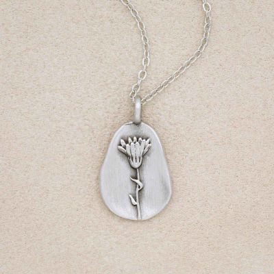 pewter October Birth Flower necklace with 18" link chain, on beige background