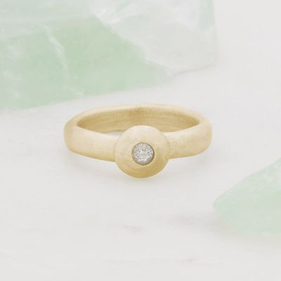 Our Love Endures ring hand-molded in 14k yellow gold and set with a 3mm birthstone or diamond 