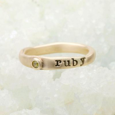 Personalized passage ring handcrafted in 10k yellow gold with your choice of birthstone 