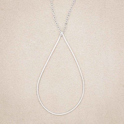 Sorrow and Joy Teardrop Necklace, handcrafted in sterling silver, on suede background
