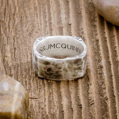 Strong + True ring handcrafted in sterling silver and hammered to an antiqued finish and personalized with a meaningful name, word or date