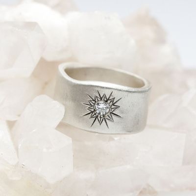 sterling silver sunburst diamond ring with a 3mm conflict free diamond 