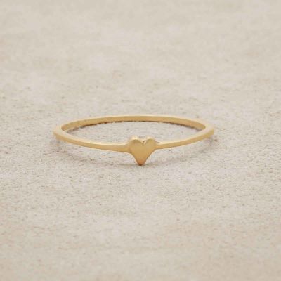 10k yellow gold sweet love ring - one heart on suede background