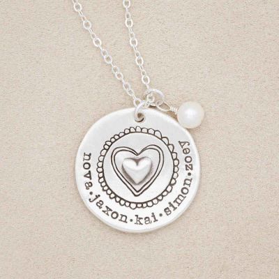 Personalized sterling silver original brave love necklace with a matte brushed finish and strung on a sliver link chain