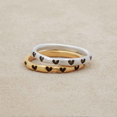 Tiny hearts stacking ring handcrafted in yellow gold plated sterling silver with a satin finish stackable with other mix and match rings