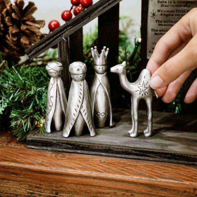 three wisemen and camel nativity figurine set handcrafted and cast in fine pewter in a nativity scene